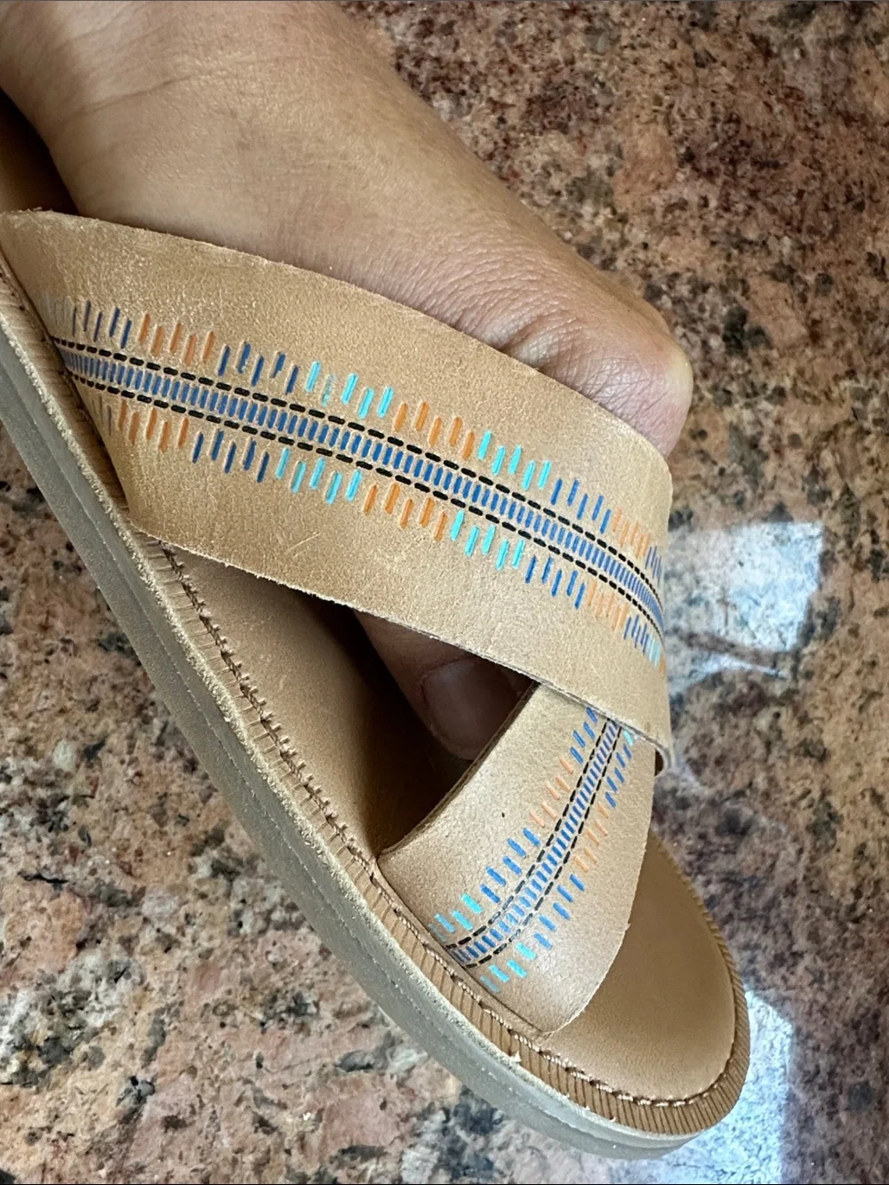 TOMS tan leather crossband slide sandals with colorful blue, aqua & orange print